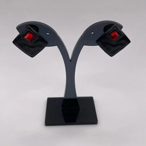 #002 Chico’s matt black metal and red crystal clip on earrings